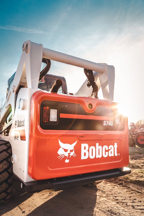 Bobcat skid steer during sunset