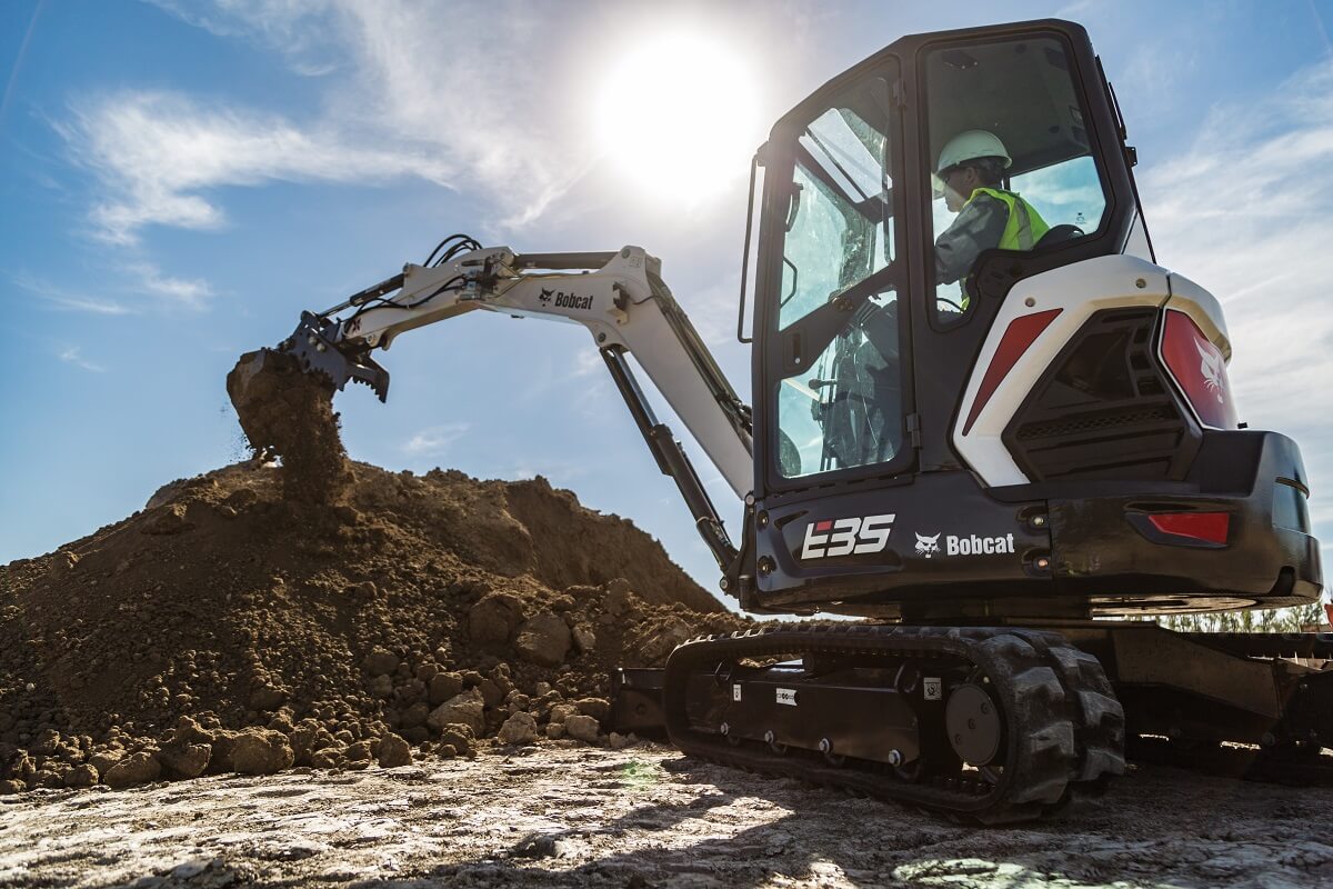 Bobcat E35 being operated in a lot